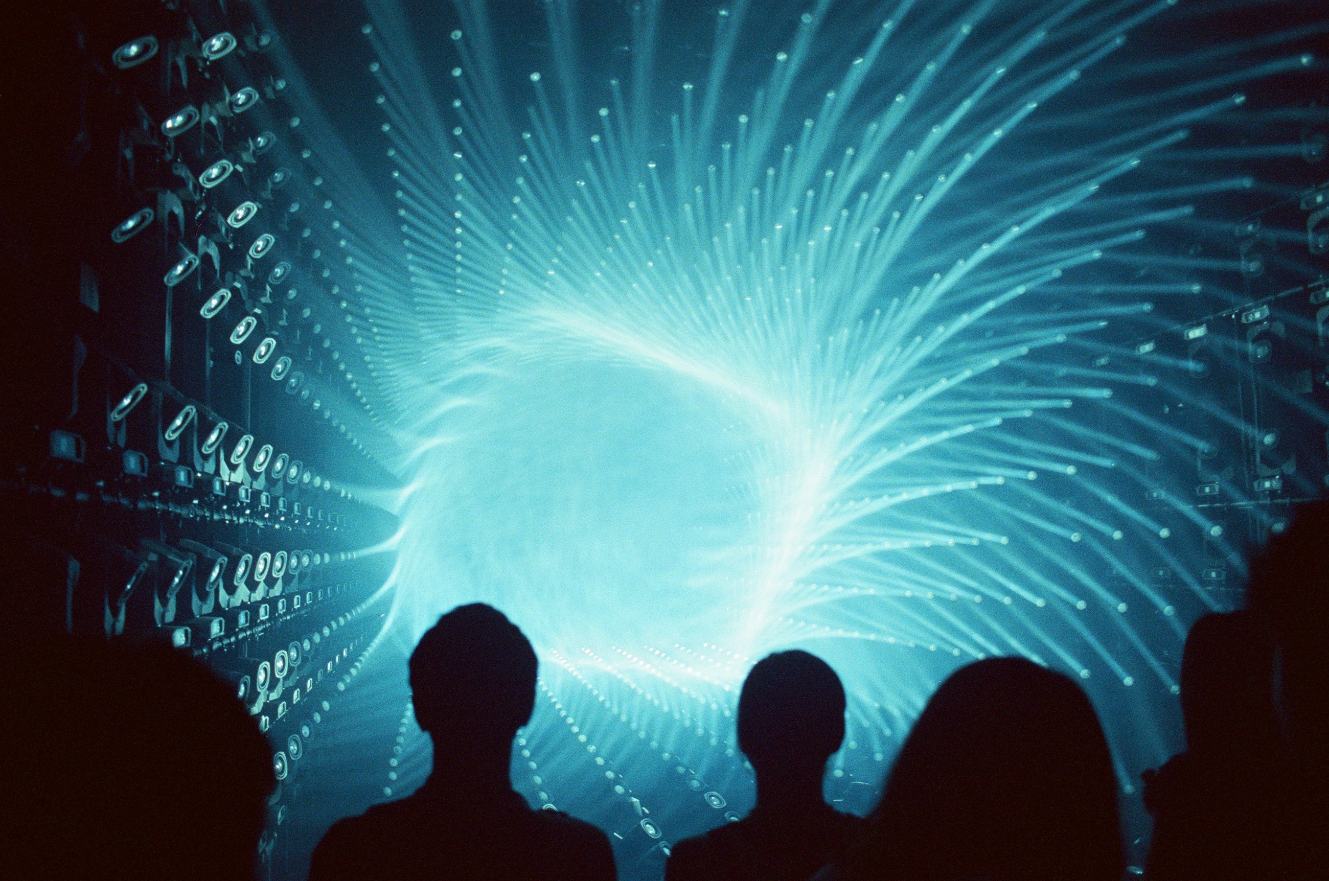 Photographic studies of a light installation, a blue jellyfish and magnetic liquid